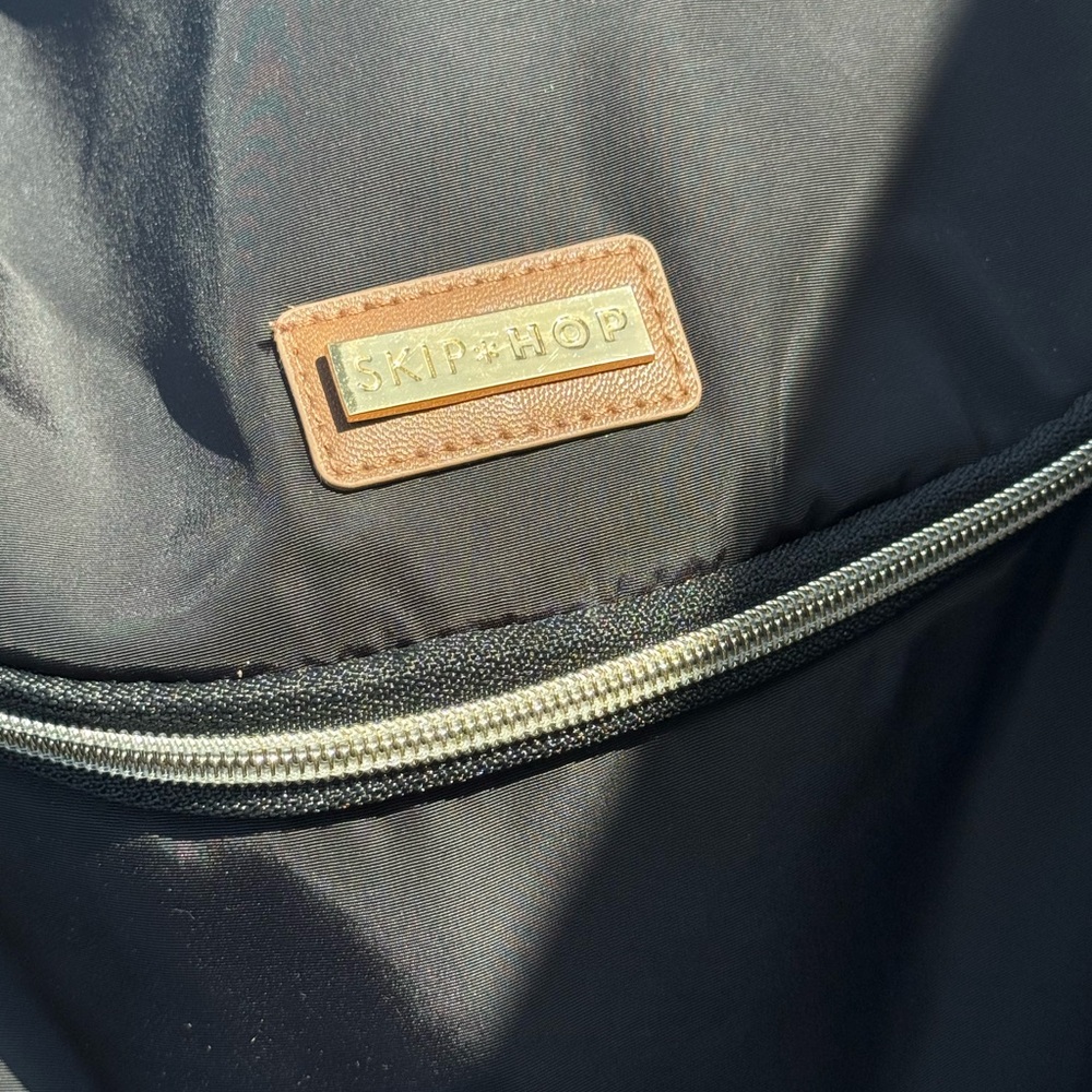Skip Hop Black Backpack with Sleek Design and Durable Material
